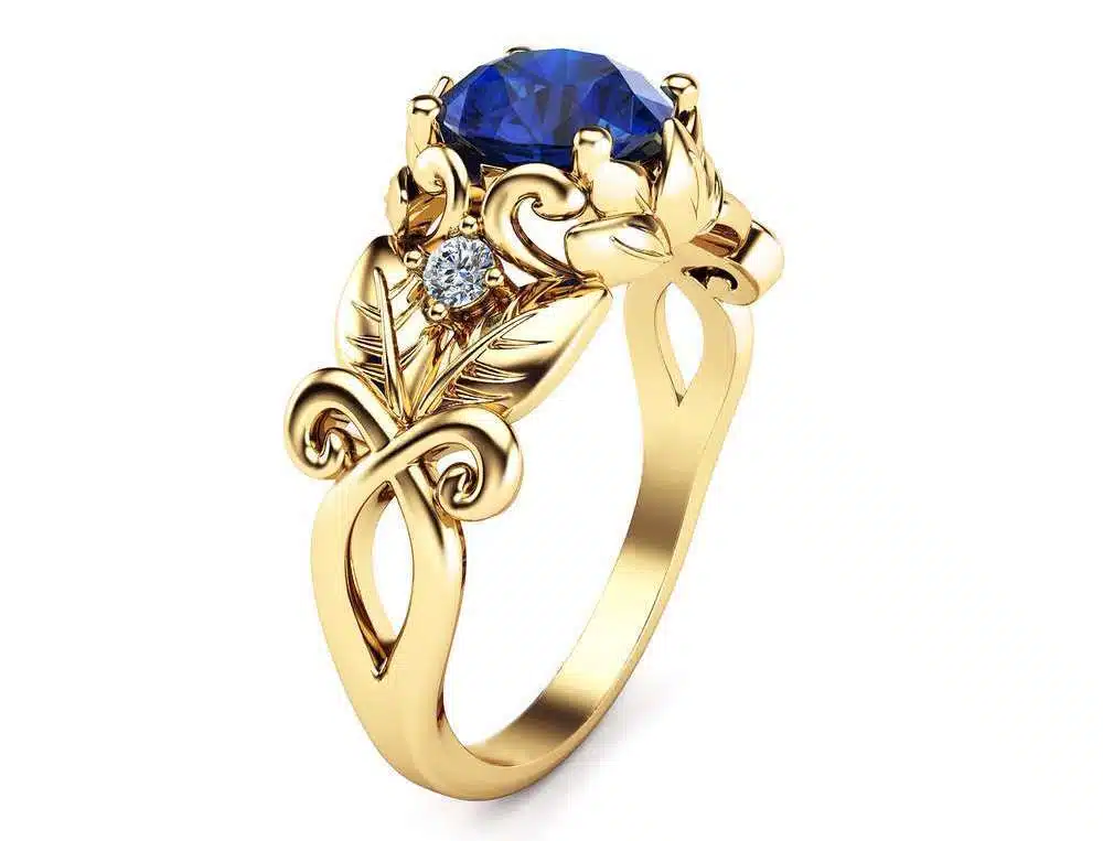 https://www.camelliarts.com/product/blue-sapphire-wedding-engagement-ring-14k-yellow-gold-sapphire-ring-unique-wedding-engagement-ring/