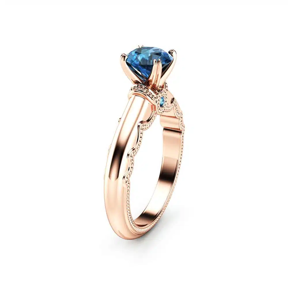rose gold blue diamond anniversary ring