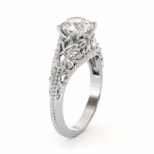 Vintage Inspired Moissanite Ring with Intricate Scroll Filigree Design