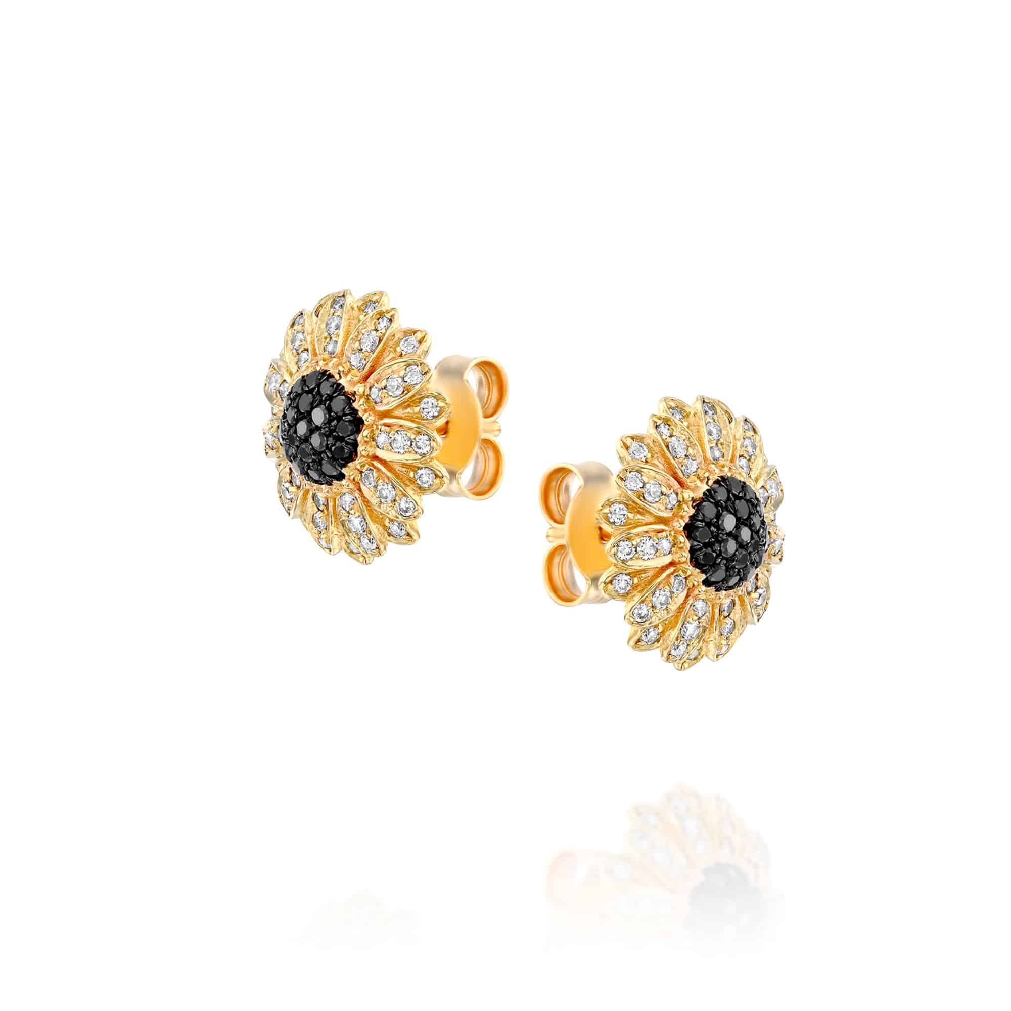 Yellow gold sunflower stud earrings at an angle, black diamond centers ringed by white diamond petals