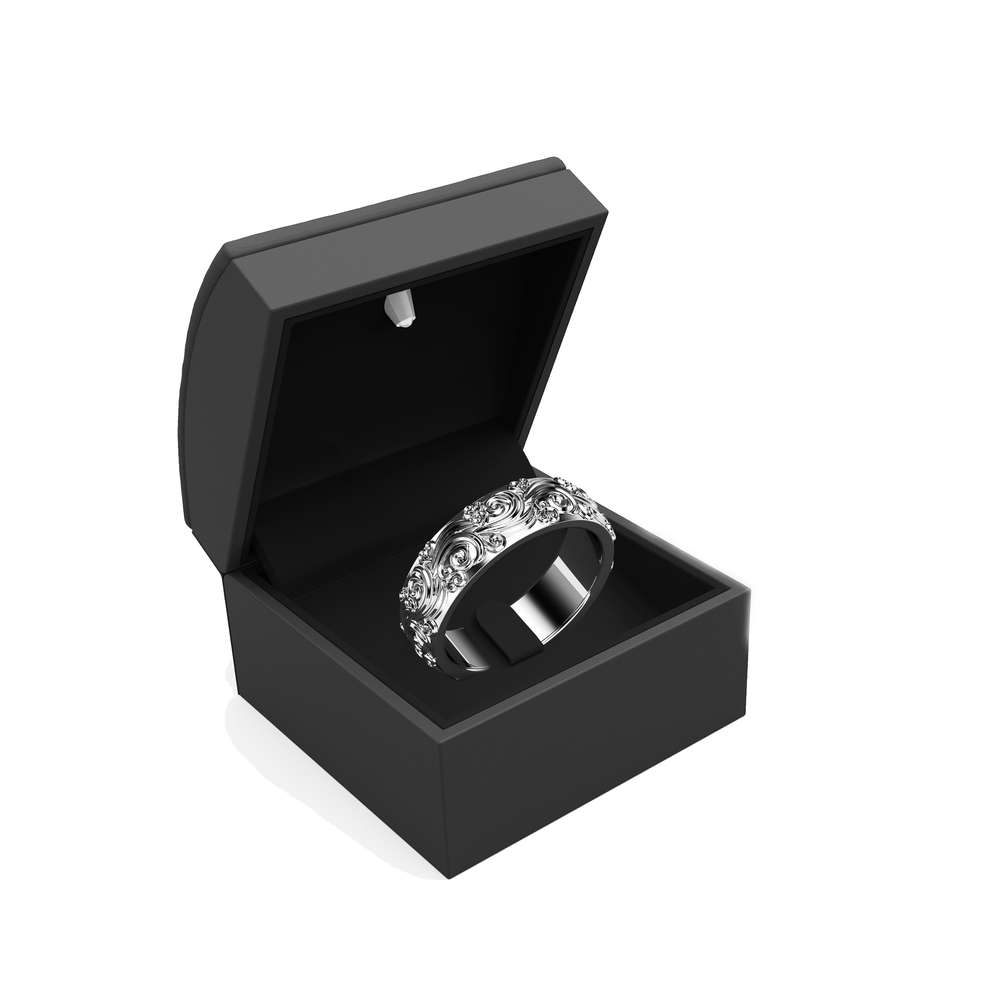 RM-0025A — White Gold, in gift box White gold carved men's wedding band presented upright in an open black gift box