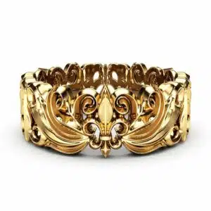 Wide yellow gold men's band seen head on, a deep fleur-de-lis relief carved across the full width