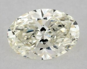 Natural 0.7 Carat K VS2 Oval Diamond