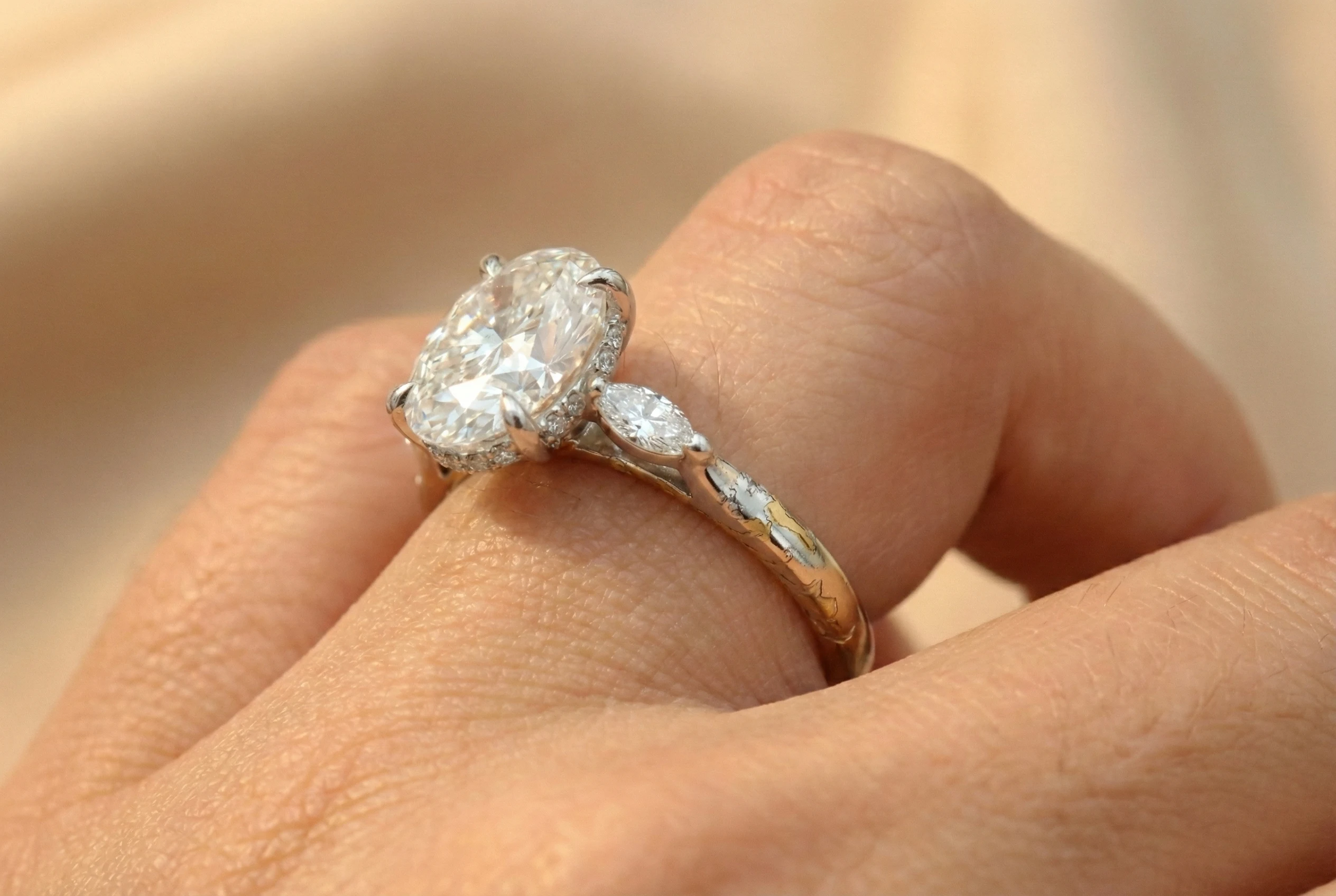 White gold turning yellow at the bottom of the band.