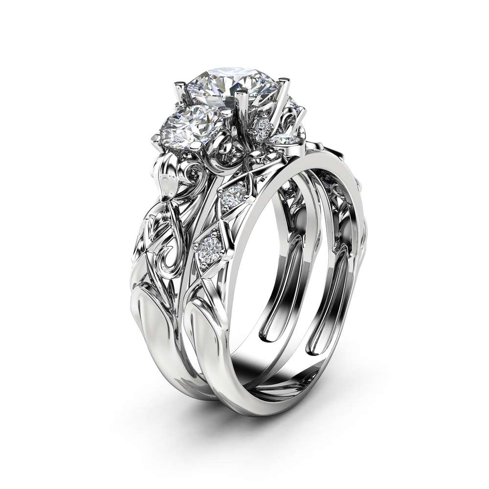 AN-0046D_3Stone_Moissanite_White_Gold_Ring_Set_1.jpg