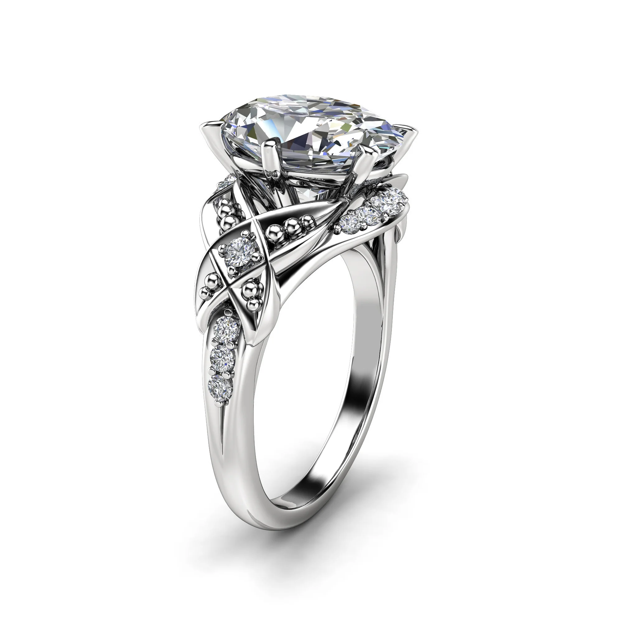 1786963948568-3k3doa.webp Three-quarter view of a white gold oval diamond engagement ring with woven pave shoulders