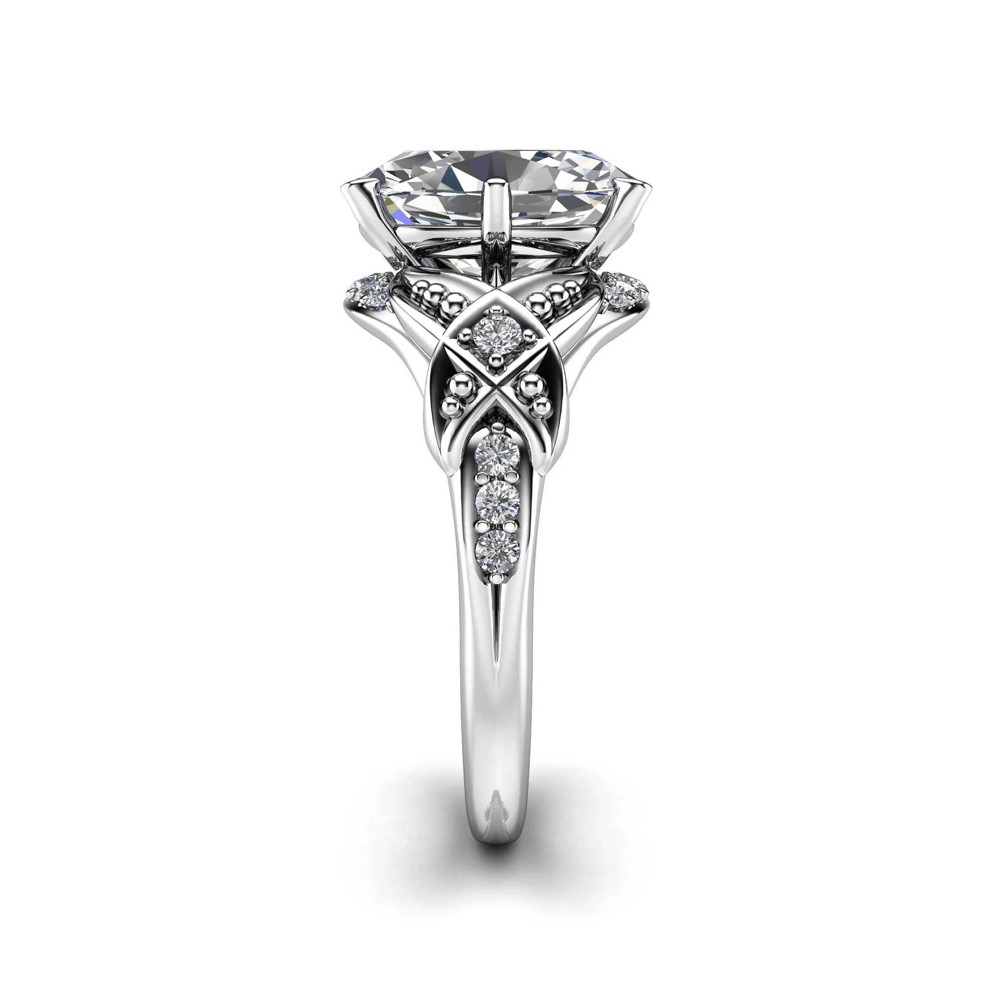 1786963953716-sa62pw.webp Profile view of a white gold oval diamond ring with a crossed X motif under the center stone