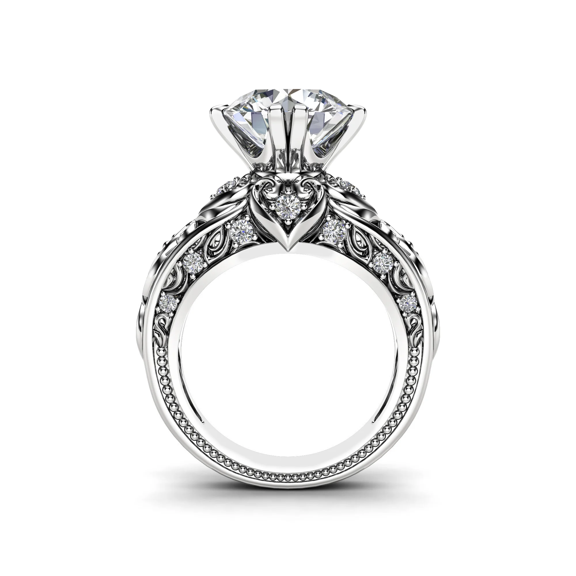 1786996818558-v26bmr.webp Side profile of a white gold round diamond engagement ring showing the milgrain band and openwork gallery